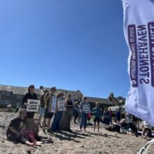 Paddle Out Protest crowd courtesy of The Bellman