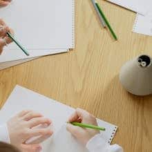 Pupils drawing eco-friendly symbols by Artem Podrez