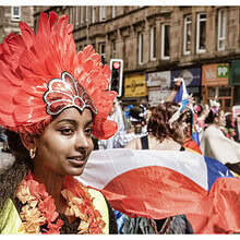 GIFC 25 Carnival Parade snakes its way through Victoria Road to Govanhill Park. Photo by Karen Gordon.