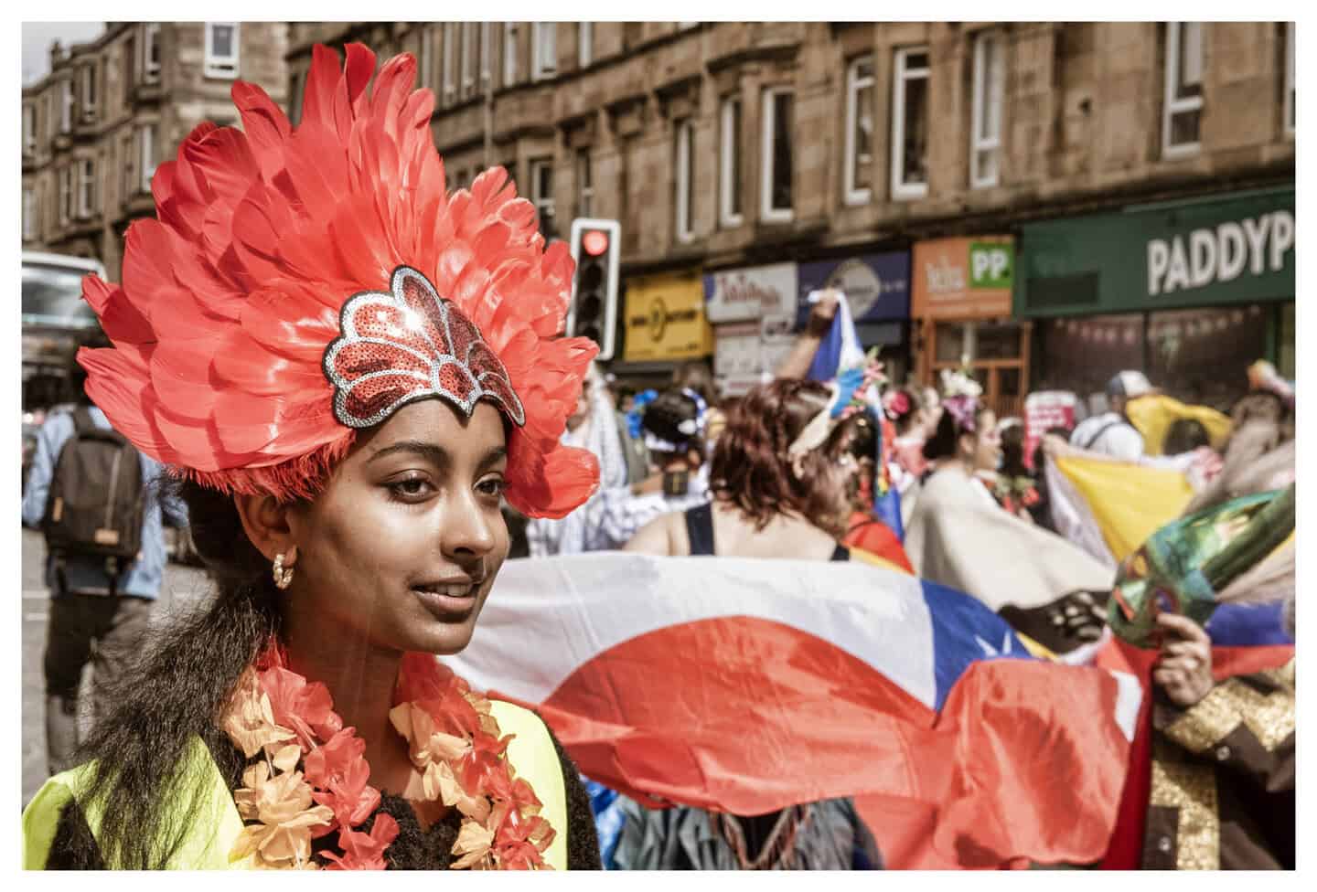 GIFC 25 Carnival Parade snakes its way through Victoria Road to Govanhill Park. Photo by Karen Gordon.