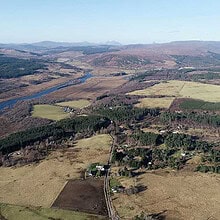 View 745ft (225m) above Achintoul in Altass, with the proposed sites for several wind farm developments, from left to right: Inveroykel, Strathoykel, Collie Beith, Allt an Tuir and Invercassley. Of the 88 turbines projected in these sites, some have a height of about 225m. By Gregor Laing