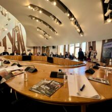 Rhiannon Davies and Samar Jamal present 'Why Community Media Matters' in a workshop in the Scottish Parliamentary event