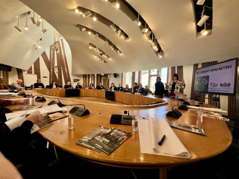 Rhiannon Davies and Samar Jamal present 'Why Community Media Matters' in a workshop in the Scottish Parliamentary event
